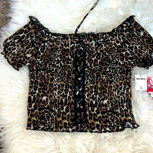 Very elastic Animal print crop top with adjustable frontal lace L size